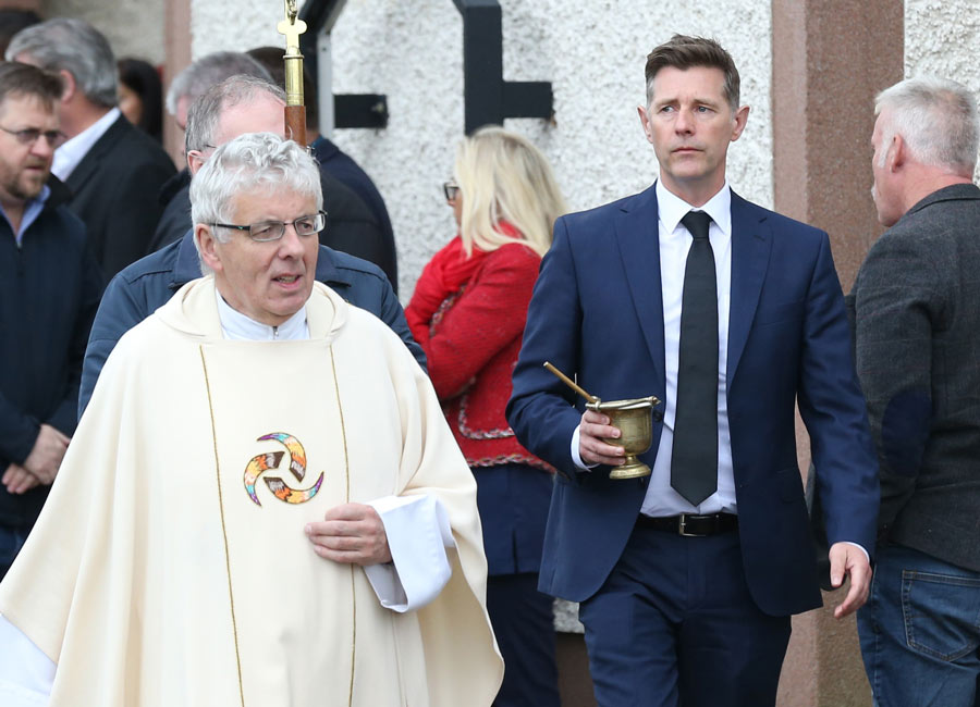 Hundreds gather for 'tiny but tough' Michael Stokes' funeral