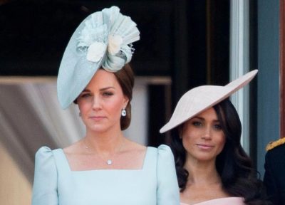 Pic: Rex meghan stood behind kate