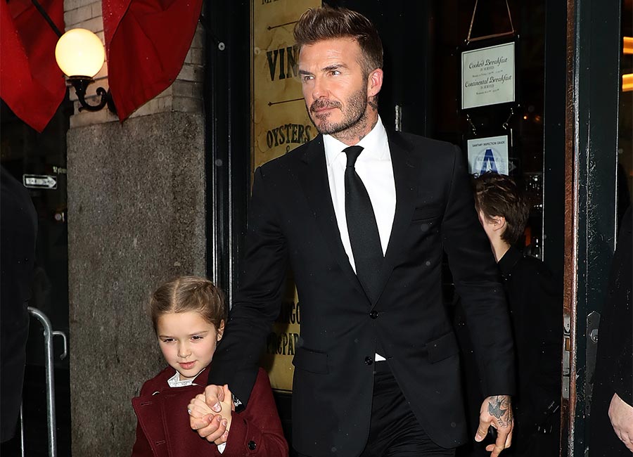 David Beckham slammed for kissing daughter Harper on the lips