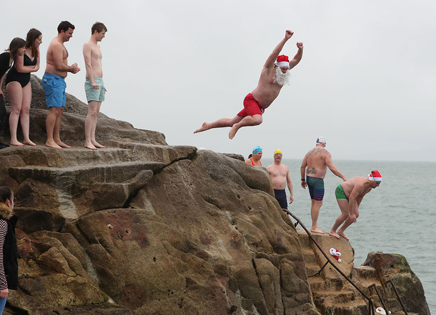 Crowds arrive at Sandycove's Forty Foot for the annual Christmas swim