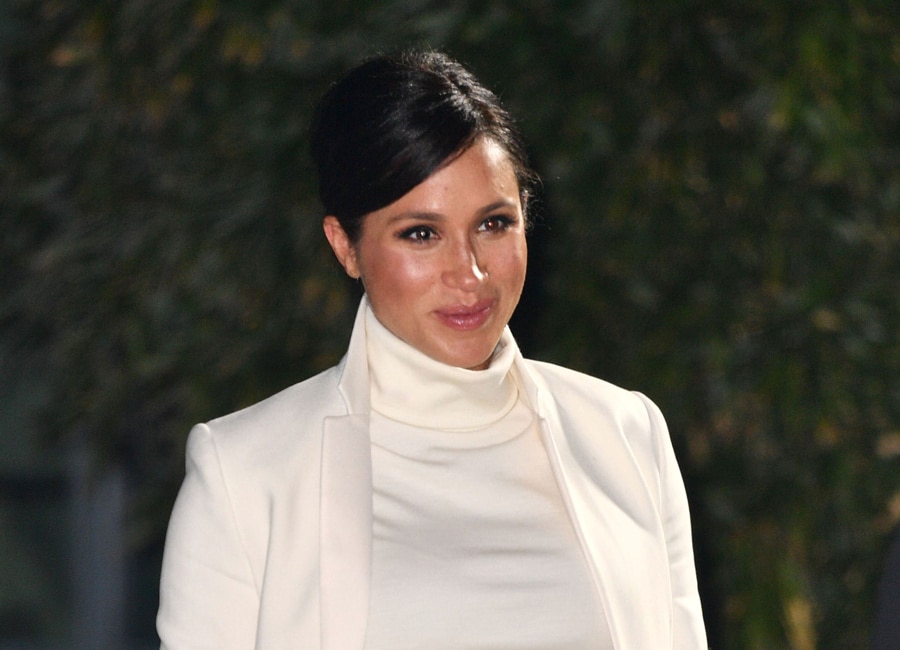 Beaming Meghan looks radiant in cream Calvin Klein at Natural History Museum