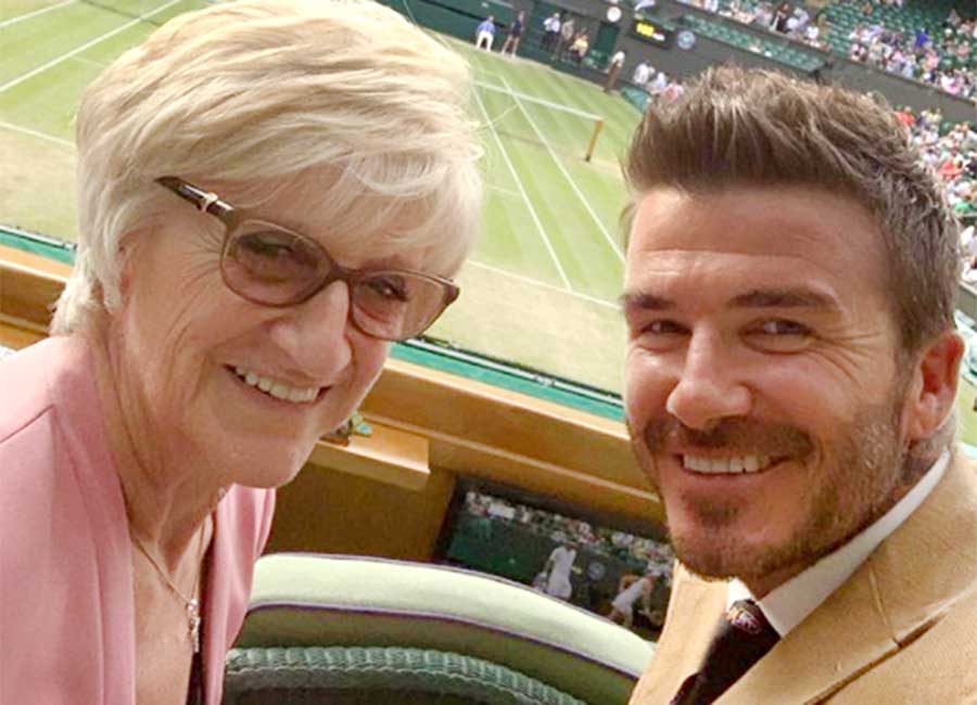 Royal treatment: David Beckham treats his mum to front row seats at Wimbledon