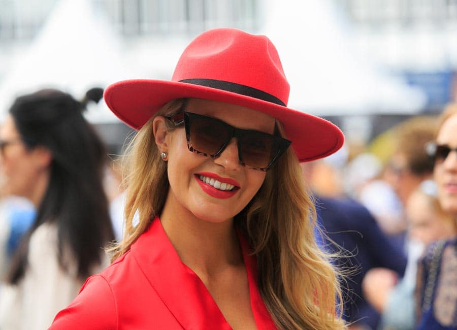 Pregnant Aoibhín Garrihy is radiant in red at the Dublin Horse Show