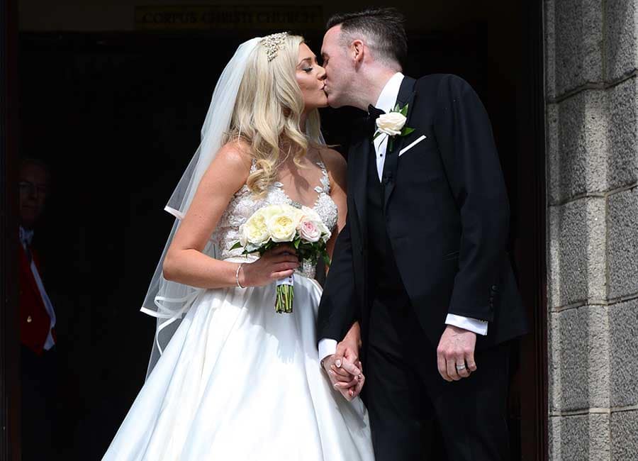 Jenny Dixon looks radiant in SECOND dress after wedding to Tom Neville