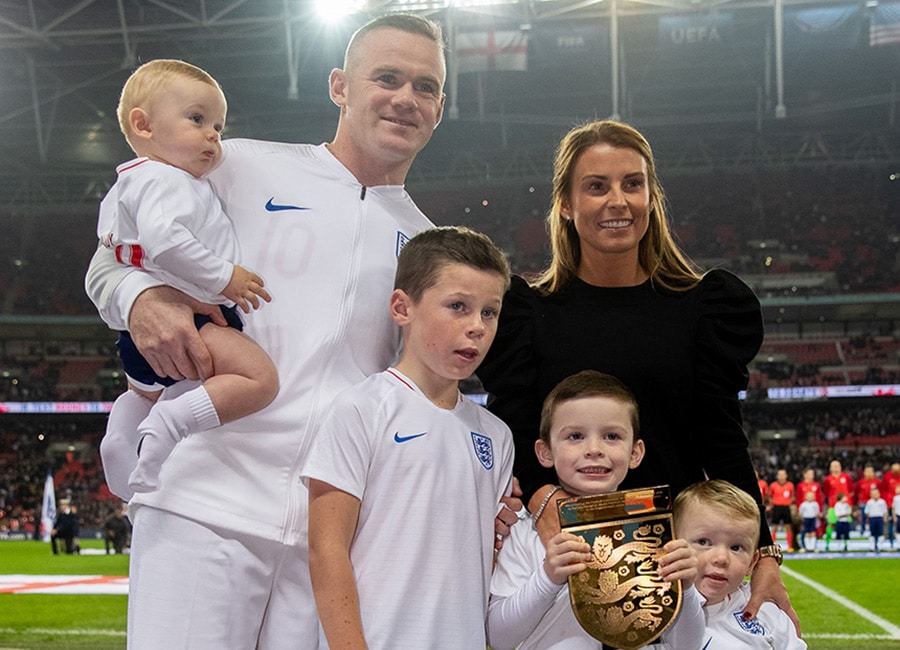 Wayne Rooney admits he 'made a mistake' after photos emerged of him partying with three women