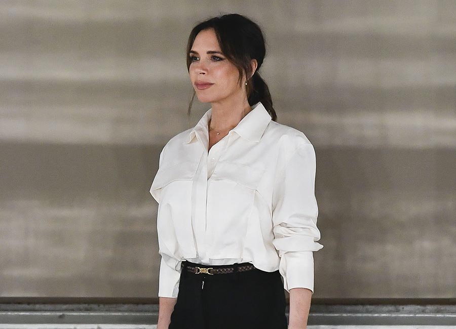 David Beckham and kids sit front row to see Victoria's London show