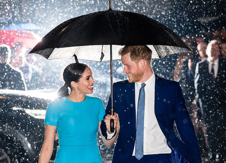 Twitter goes wild for Harry and Meghan's cinematic umbrella snap