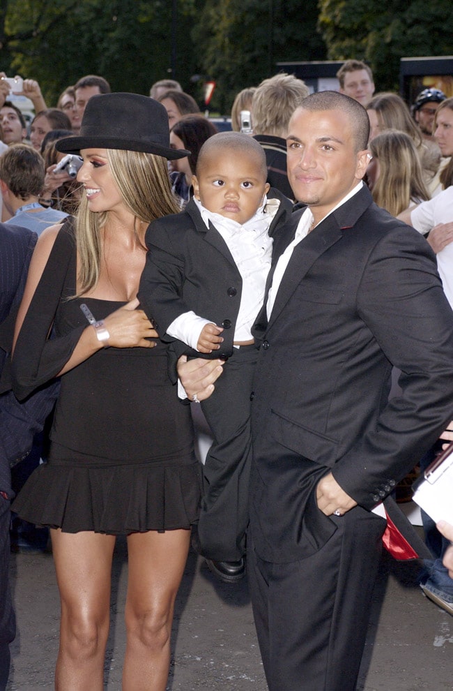 Katie Price, Peter Andre and Harvey Pic: Rex