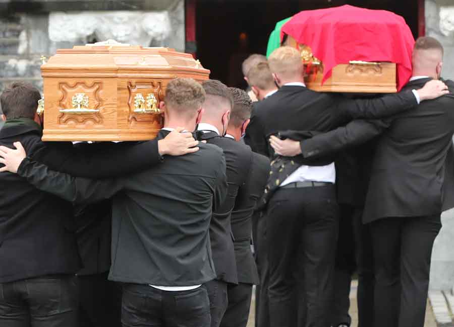 Hundreds line the streets for funerals of mother and son killed in double murder-suicide