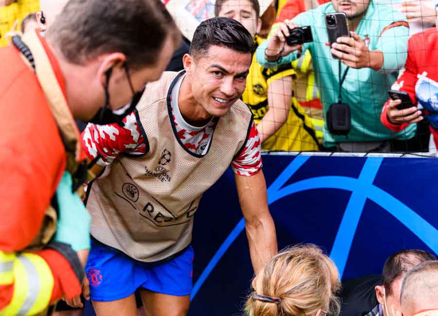 Cristiano Ronaldo rushes to help female steward after he knocks her out