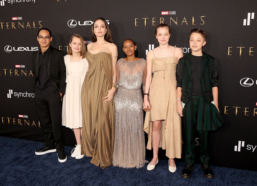 Angelina Jolie's daughter wears her old Oscars dress as family opt for vintage on red carpet