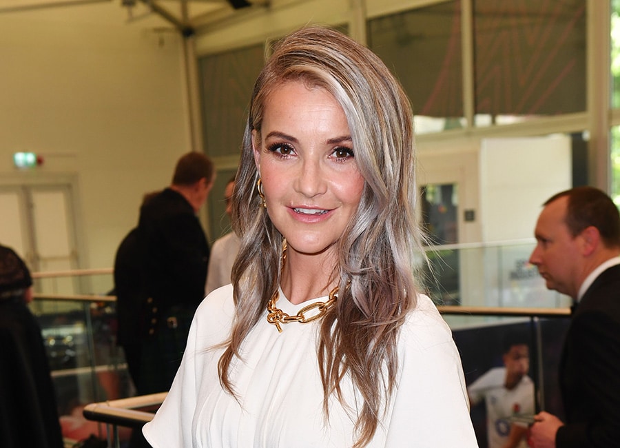 Smiling Helen Skelton enjoys solo night out after marriage split