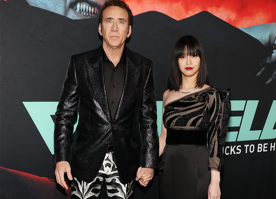 Is Nicolas Cage getting styled by fifth wife Riko as his pants win at premiere!