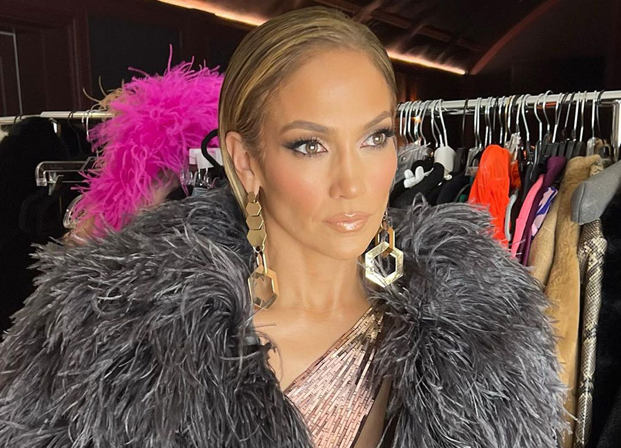 J Lo looks like the ultimate queen in ultra sexy gown
