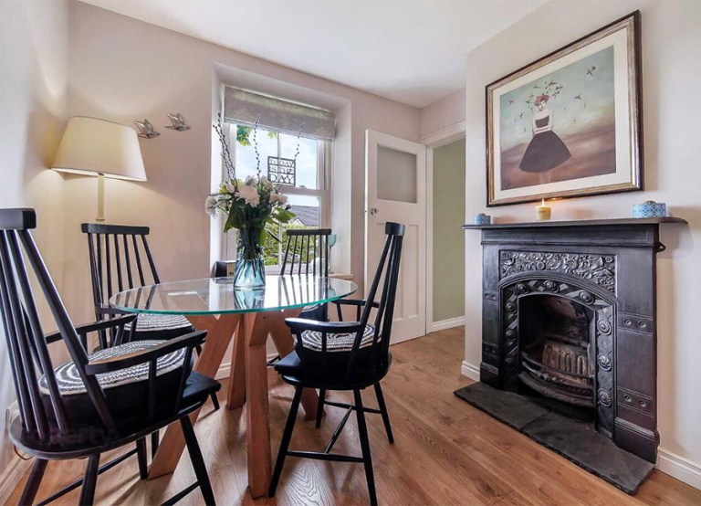 MILFORD ROAD, Ramelton, Bridgend F92 P9K6 €195,000 interior sitting living room carpet fireplace chairs table wooden decor