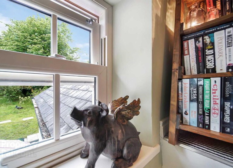 MILFORD ROAD, Ramelton, Bridgend F92 P9K6 €195,000 interior bookcase book room books reading flying pig ornament