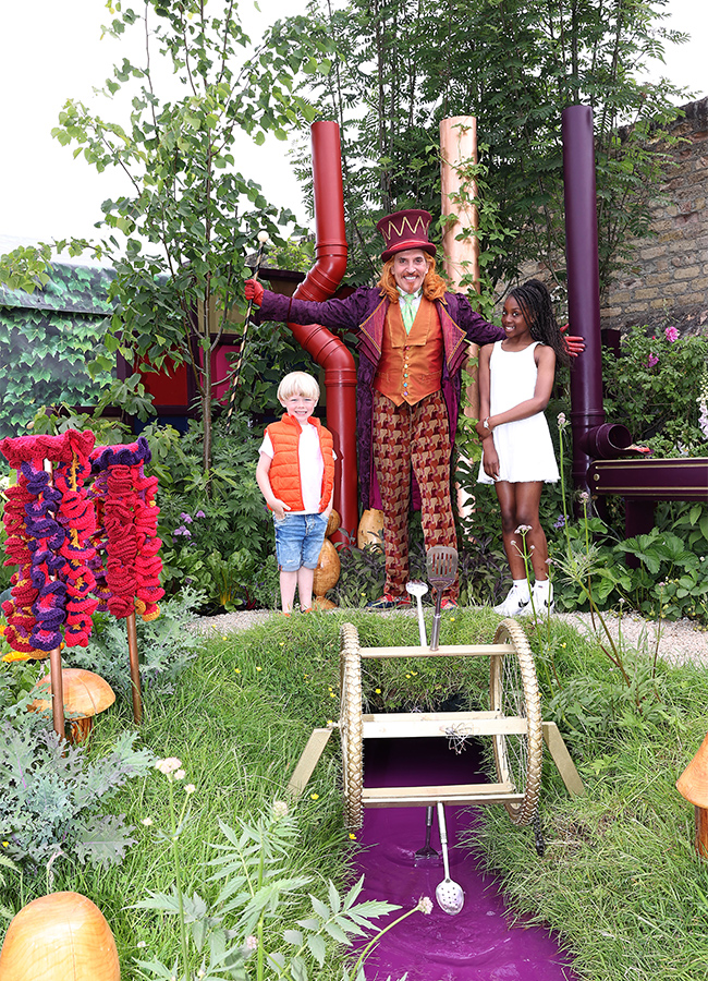 Gareth Snook who plays Willy Wonka in Charlie and The Chocolate Factory - The Musical pictured with with Anais Tiana Bakala (10) and Harley Judge (6)