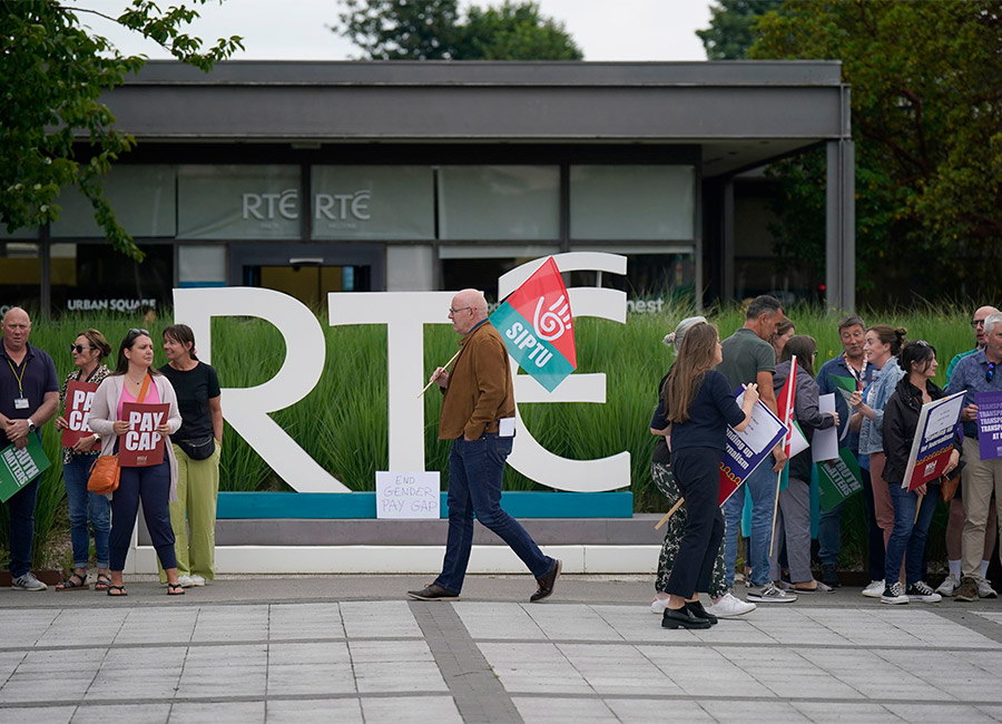 Members of staff from RTE take part in a protest at the broadcaster's headquarters in Donnybrook, Dublin