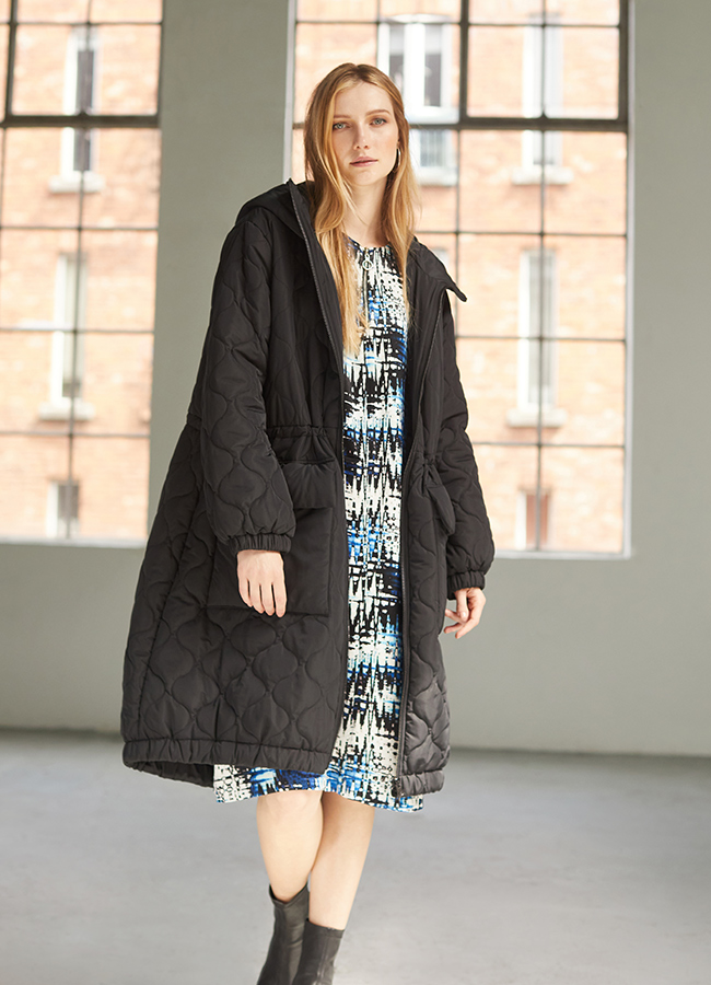 Carolyn Donnelly The Edit Drawstring waist hooded coat worn over the Cobalt Print Dress, €95, €70 Dunnes Stores