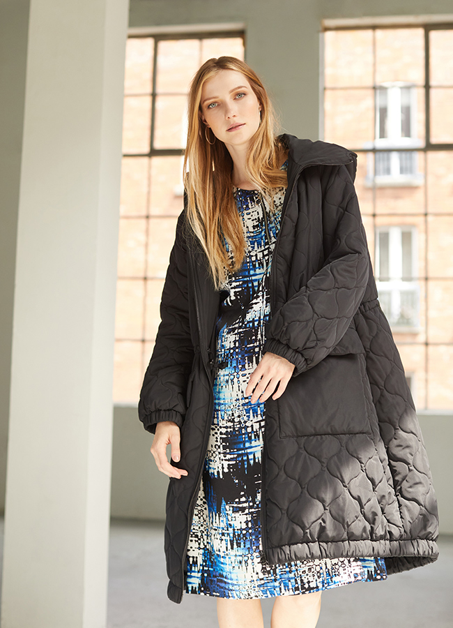 Carolyn Donnelly The Edit Drawstring waist hooded coat worn over the Cobalt Print Dress, €95, €70 Dunnes Stores