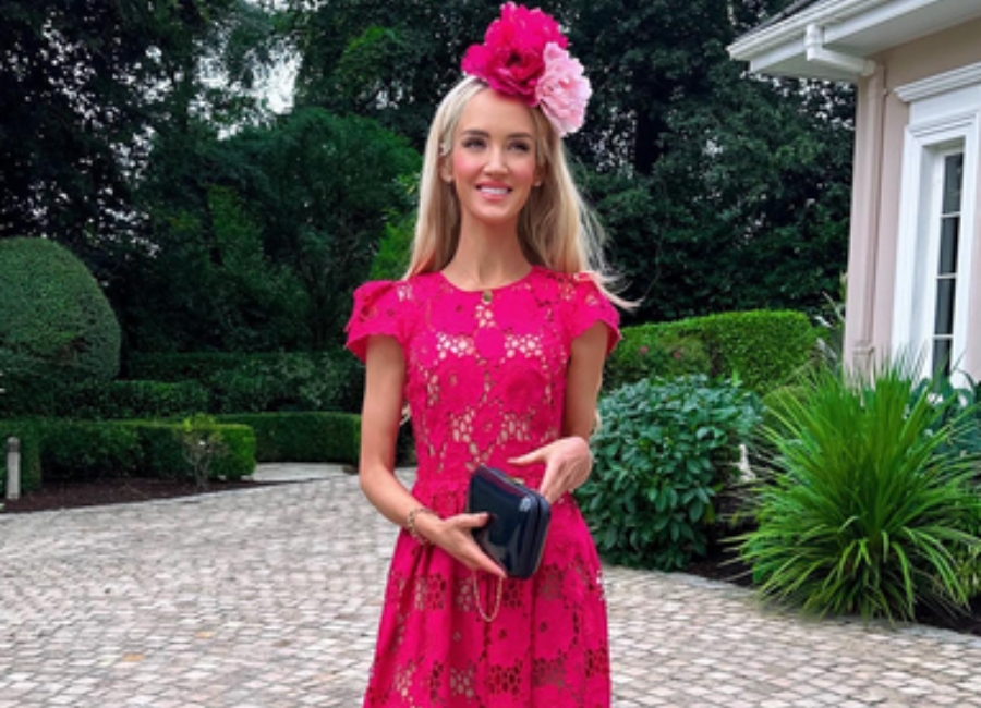 Dr Doireann O'Leary beams in pink designer midi dress at baby's christening
