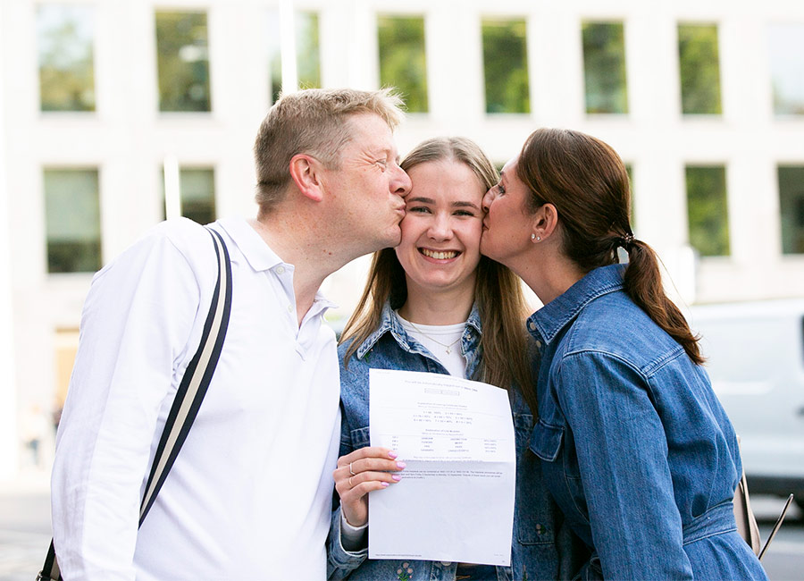Genevieve Holmes 19 from Loreto on the Green with her parents Barry and Tracy Holmes all from Terenure celebrate leaving cert results in Dublin's city centre