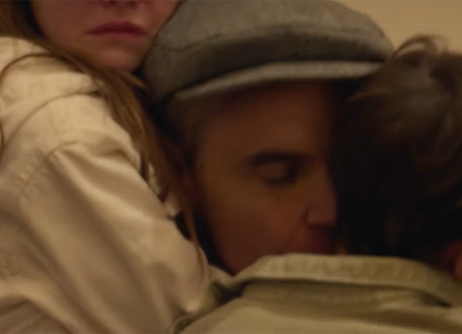 Robbie Williams with two of his children. Pic: Netflix