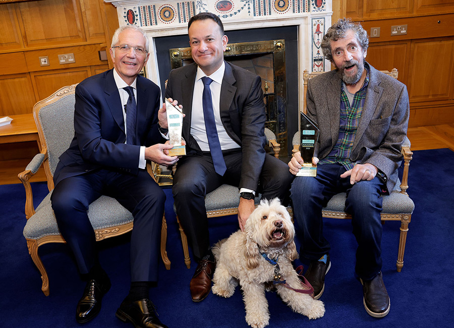 Taoiseach presents Charlie Bird and Paul Allen with World Public Relations award for ‘Climb with Charlie’. Pic: Supplied
