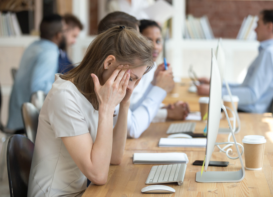 woman struggling to concentrate work