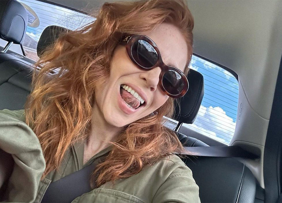 Delighted Angela Scanlon gets a very Irish welcome home as she flies into Cork