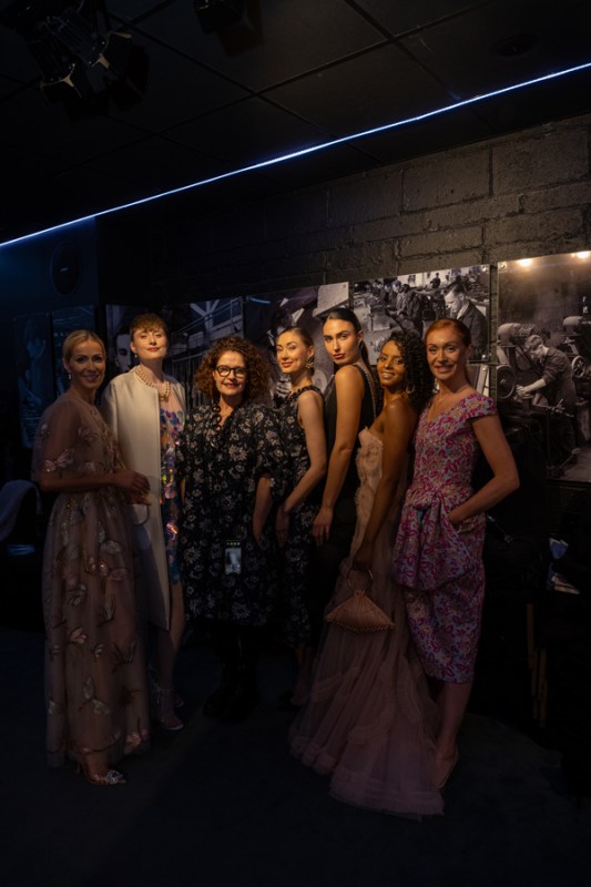 Designer Helen Cody with models wearing her creations.