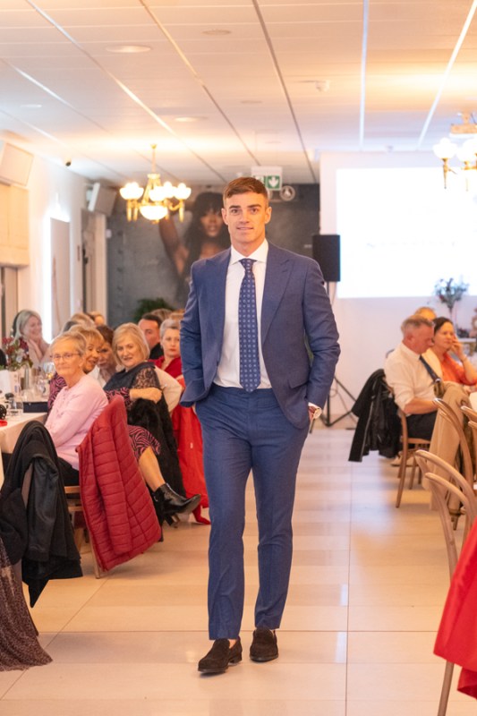 A model wearing Louis Copeland suit.