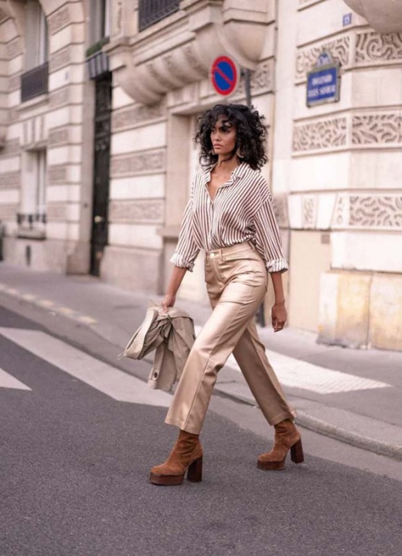 Model wears On Trend gold faux leather trousers