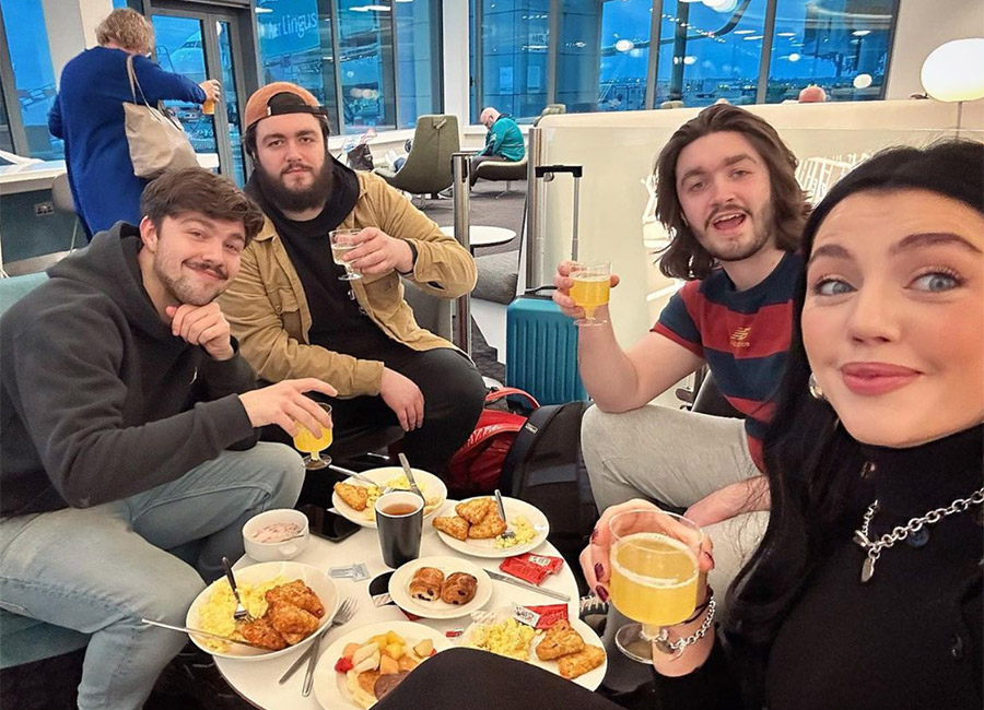 Missy Keating with three of her stepbrothers - Christian, Gabe, Rian - at Dublin Airport