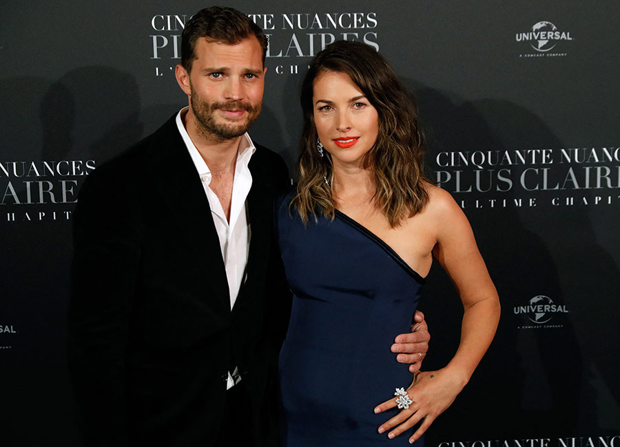 Jamie Dornan and wife Amelia Warner. Pic: Patrick Kovarik/AFP via Getty Images