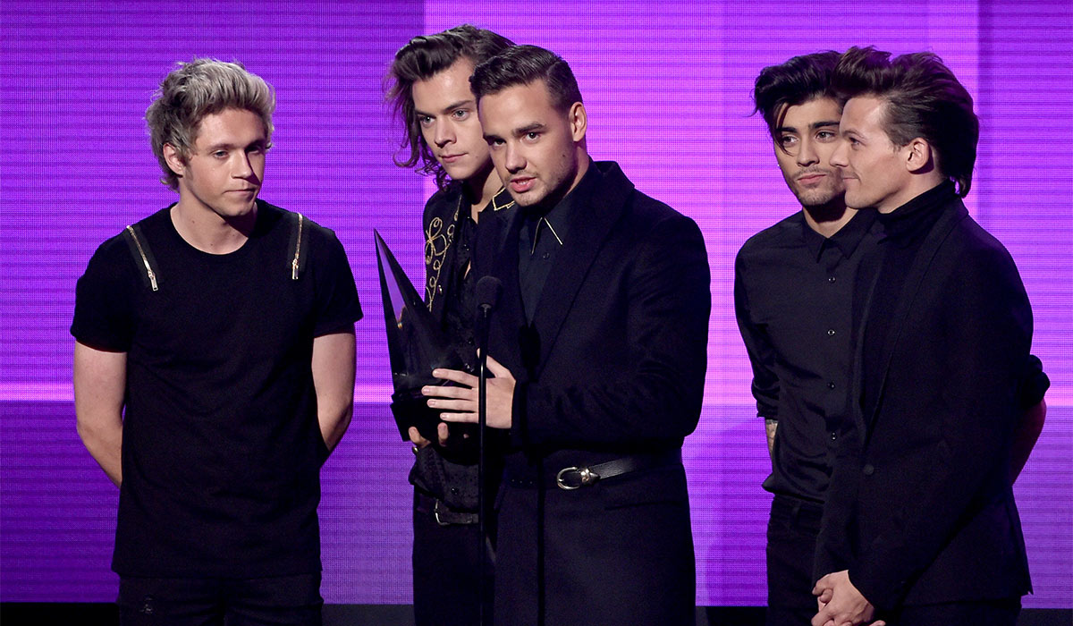 Recording artists Niall Horan, Harry Styles, Liam Payne, Zayn Malik and Louis Tomlinson of One Direction accept the Artist of the Year award onstage at the 2014 American Music Awards at Nokia Theatre L.A. Pic: Getty Images