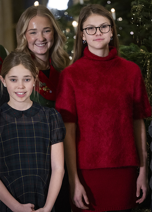 Princess Leonore and Princess Estelle help dress the royal Christmas trees delivered to the Royal Palace by the Forestry College's student union. Pic: REX