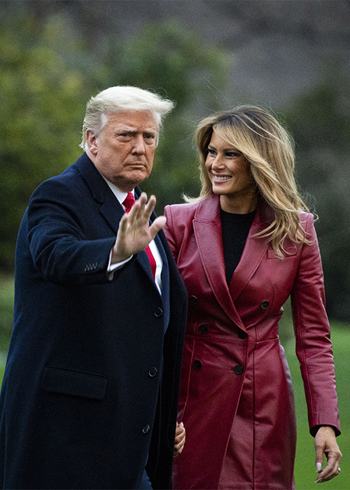 Former President Donald Trump waves as he walks with First lady Melania Trump as they depart on the South Lawn of the White House. Pic: Getty Images