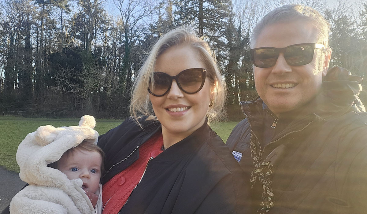 Rebecca Grimes and her husband Paul Donegan with their daughter Dara