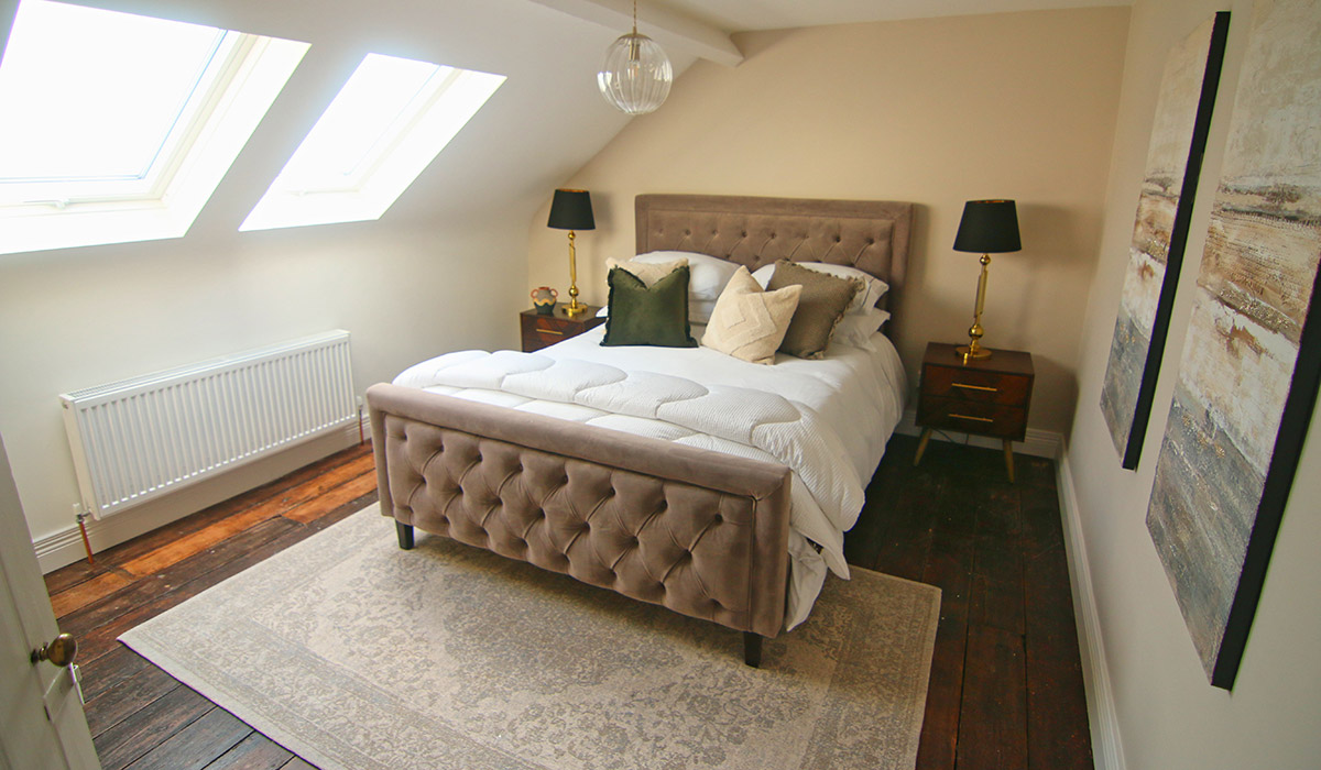 Bedroom in the Rathmullan terrace house in Co. Donegal. Pic: RTÉ / The Great House Revival