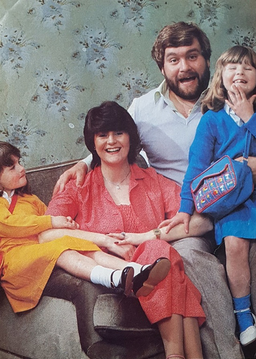 Amanda Grace with her dad Brendan, mum Eileen and sister Mel as children