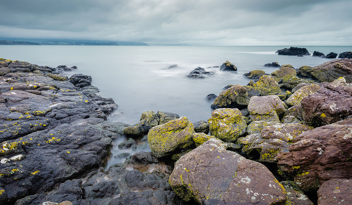 On Skernaghan Point’s rocky shoreline, Browns Bay, Islandmagee, County Antrim, Northern Ireland. Pic: Shutterstock
