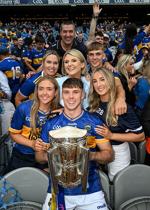 Johnny Ryan of Tipperary and family celebrate with the Liam MacCarthy cup after their side's victory in the GAA Hurling All-Ireland Senior Championship final match between Cork and Tipperary at Croke Park in Dublin. Pic: Stephen McCarthy/Sportsfile