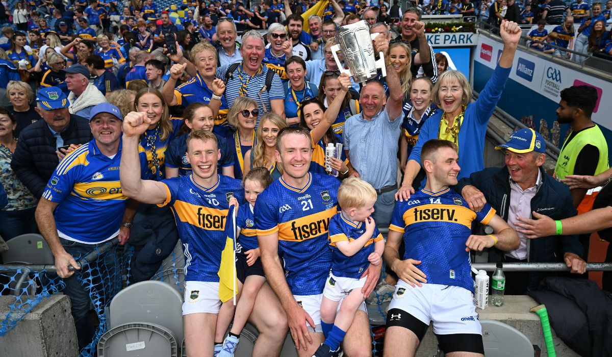 Tipperary brothers- Brian McGrath, Noel McGrath, and his son Sam, and John McGrath celebrate with the Tipp team and Liam MacCarthy cup Pic: Stephen McCarthy/Sportsfile