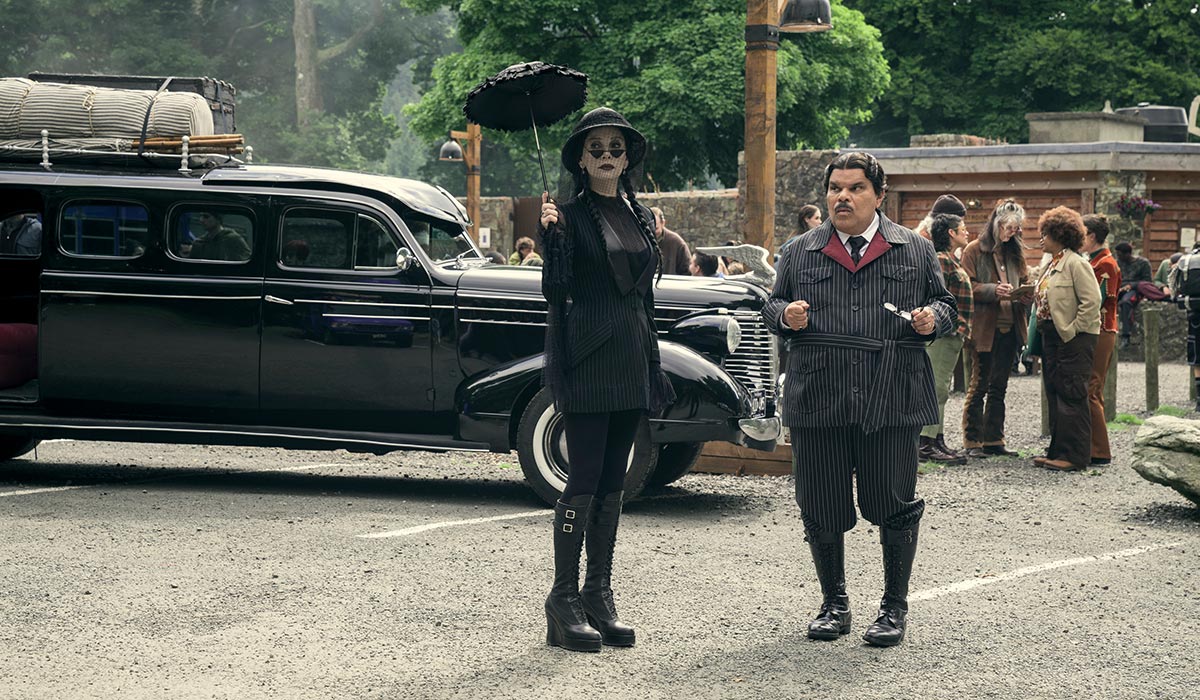 Wednesday. (L to R) Catherine Zeta-Jones as Morticia Addams, Luis Guzmán as Gomez Addams in episode 203 of Wednesday. Pic: Netflix