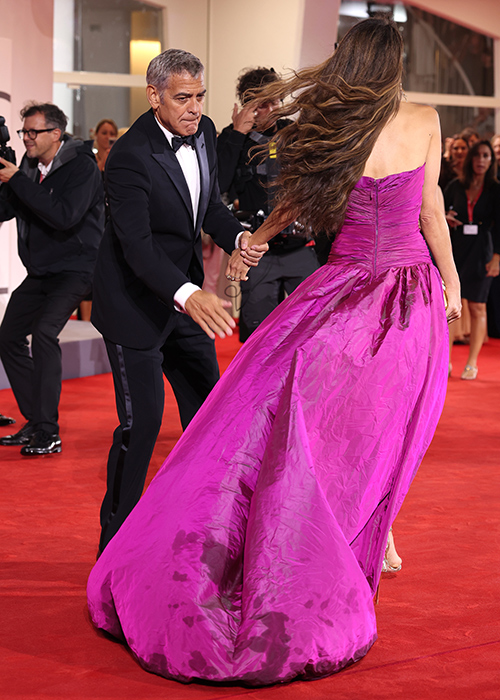 VENICE, ITALY - AUGUST 28:  George Clooney and Amal Clooney during the "Jay Kelly" red carpet during the 82nd Venice International Film Festival on August 28, 2025 in Venice, Italy. (Photo by Gisela Schober/Getty Images)