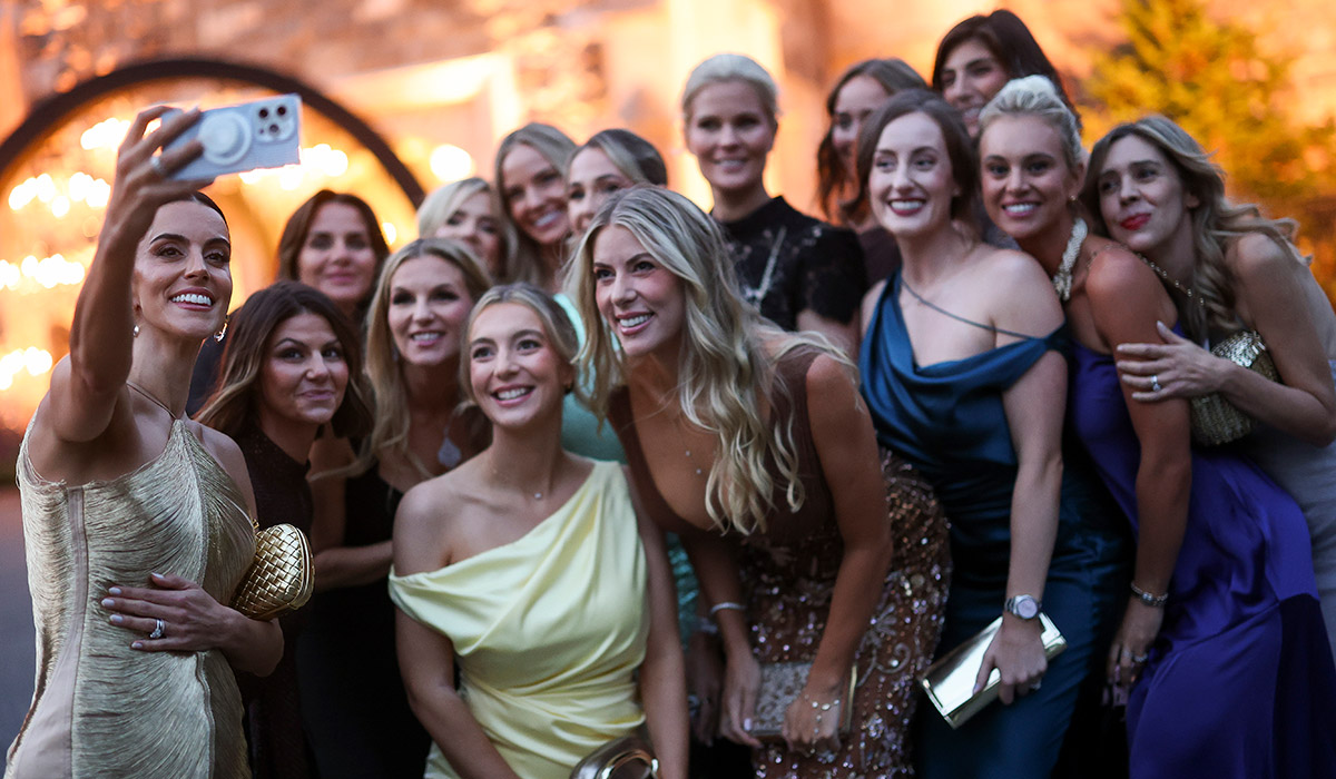 SANDS POINT, NEW YORK - SEPTEMBER 23: Diane Donald, wife of Captain Luke Donald of Team Europe takes a selfie with other partners of Team Europe during the Ryder Cup Teams' Welcome Dinner prior to the Ryder Cup 2025 at Hempstead House on September 23, 2025 in Sands Point, New York. (Photo by Carl Recine/Getty Images)