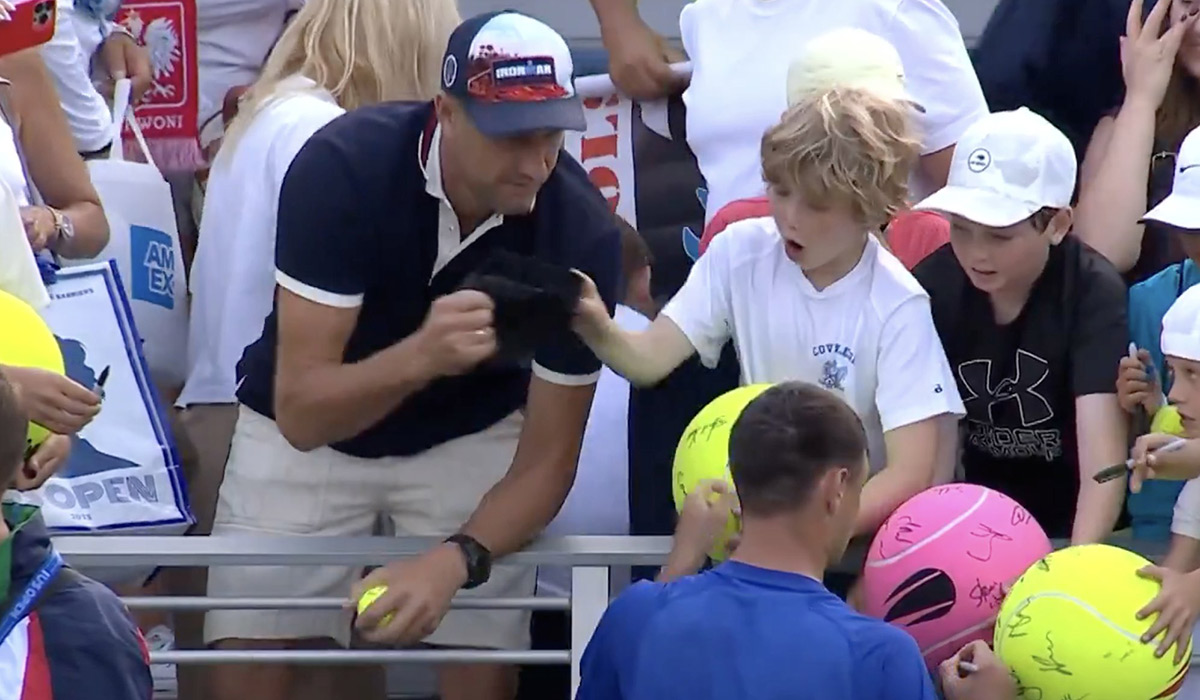 Millionaire who swiped tennis star's hat from child at US Open makes grovelling apology